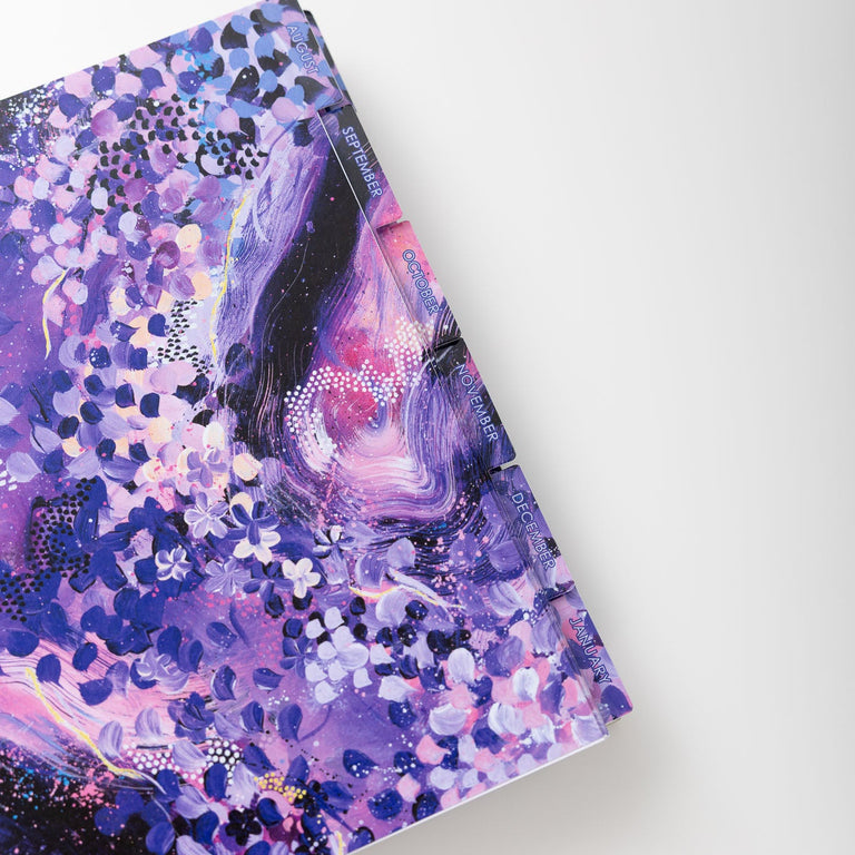 Colorful notebook with abstract design on a white background