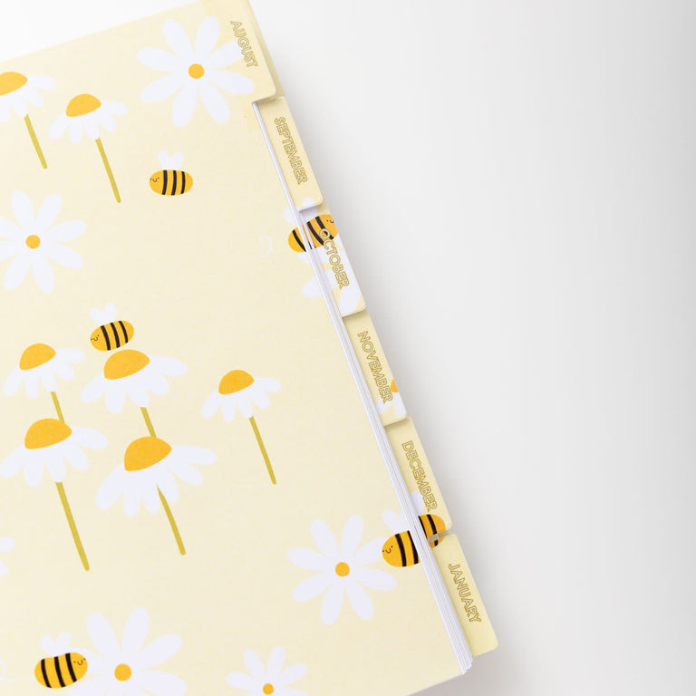 Notebook with floral design on a white background