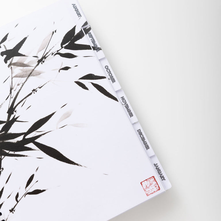 Notebook with bamboo design on cover and spine on a white background