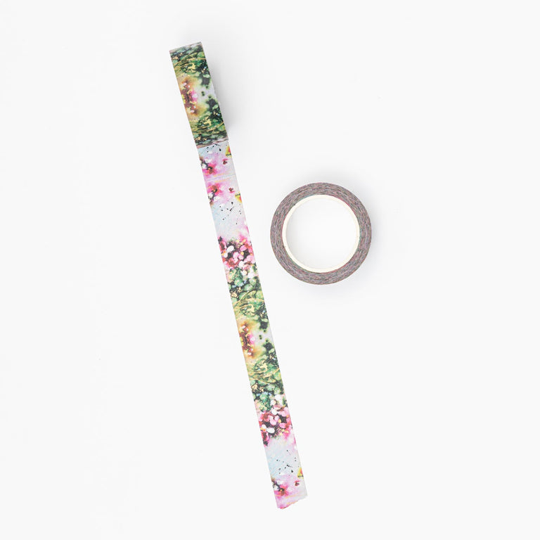 Floral-patterned headband and hair tie on a white background