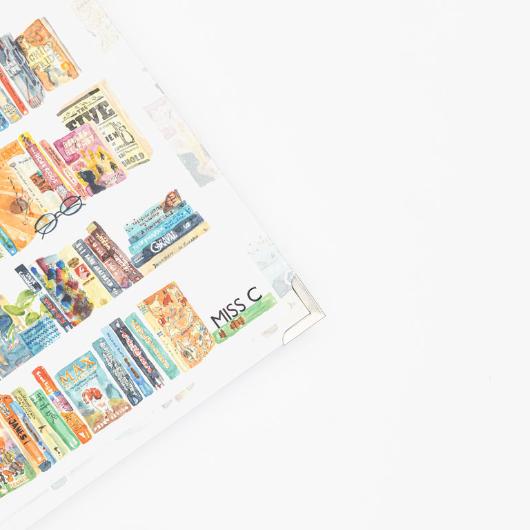 Colorful book spines arranged in a grid pattern on a white background