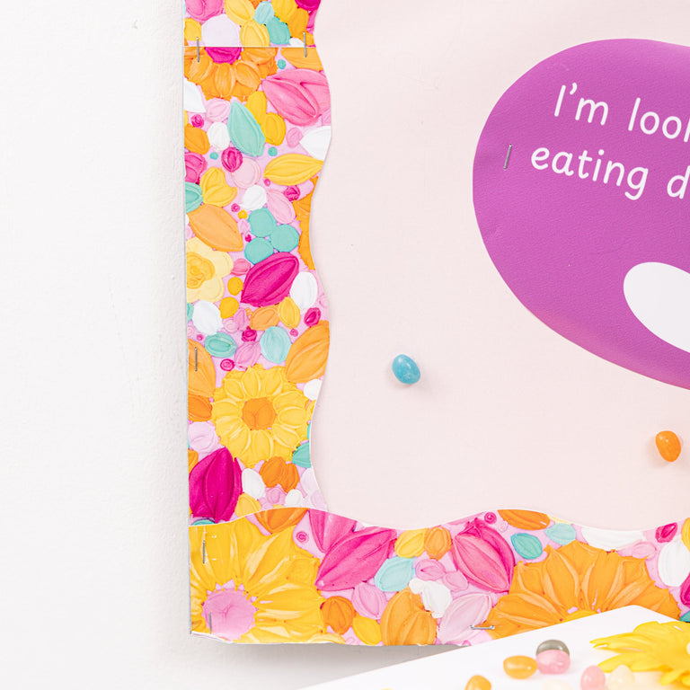 Colorful children's book with floral design and text on a white background